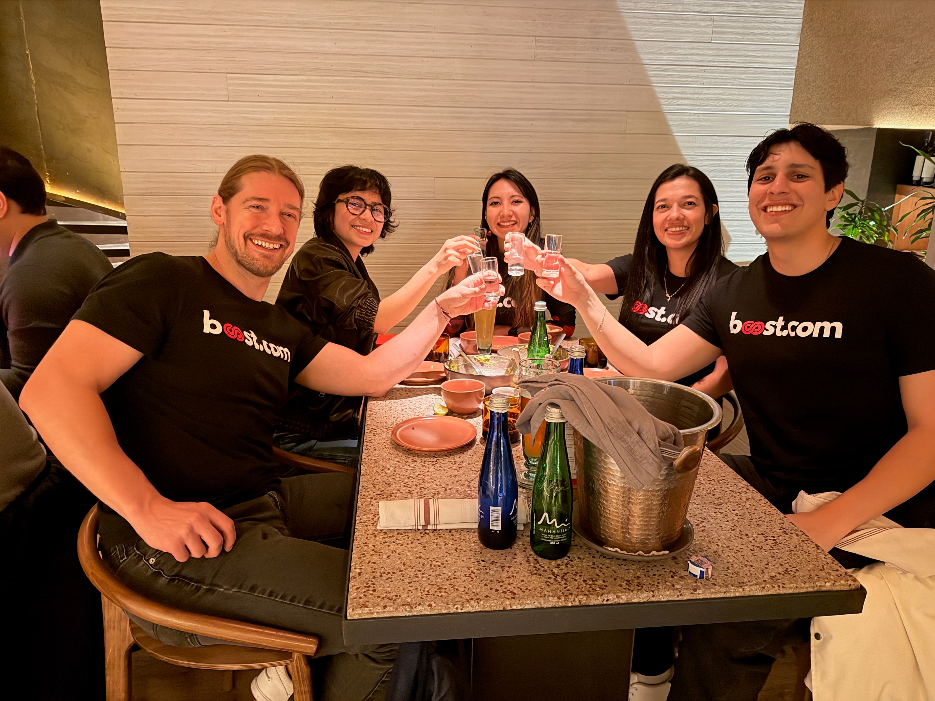 The b00st.com team during a company dinner in Bogotá, Colombia 2026.